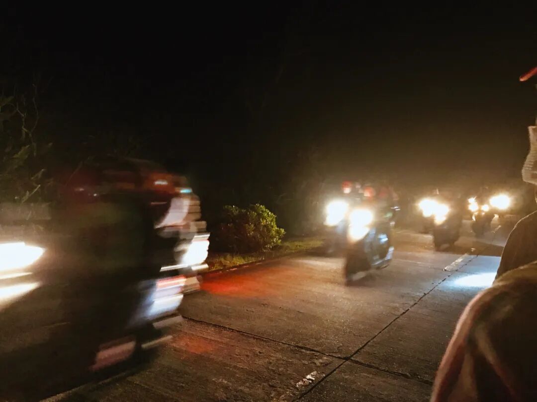 Group of scooters on Green Island, ready for a night tour to see deer.