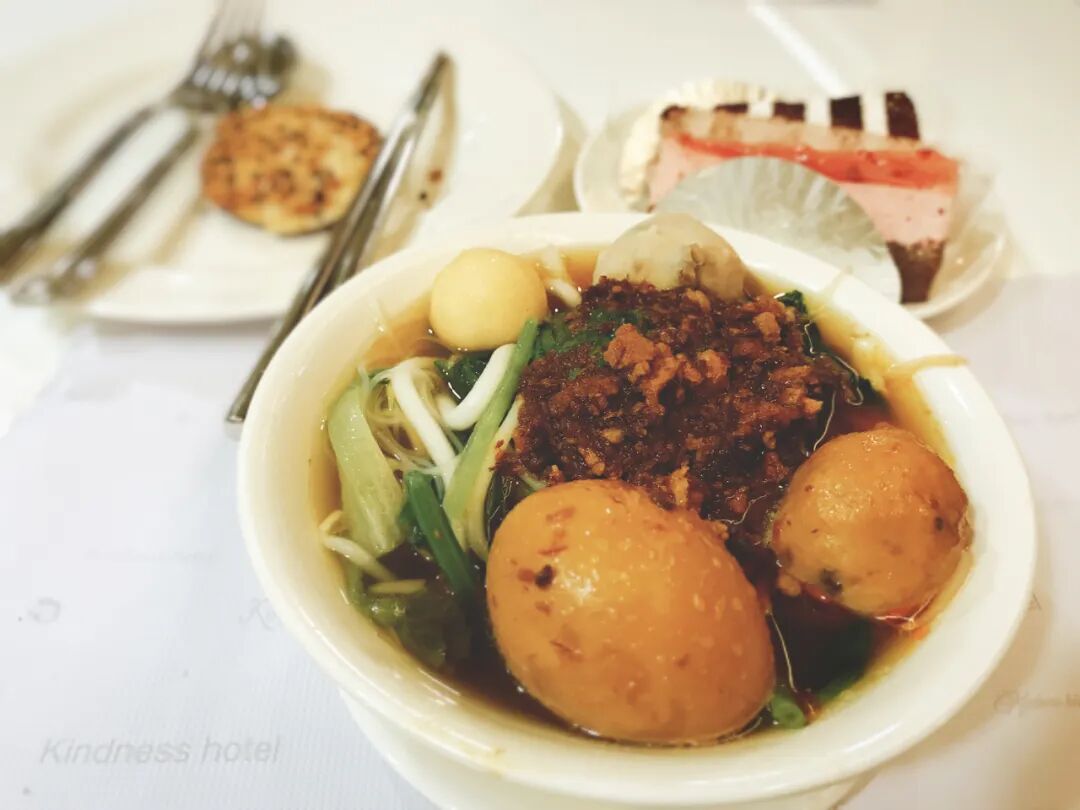 Drinks station at a hotel buffet, providing various beverages for guests.