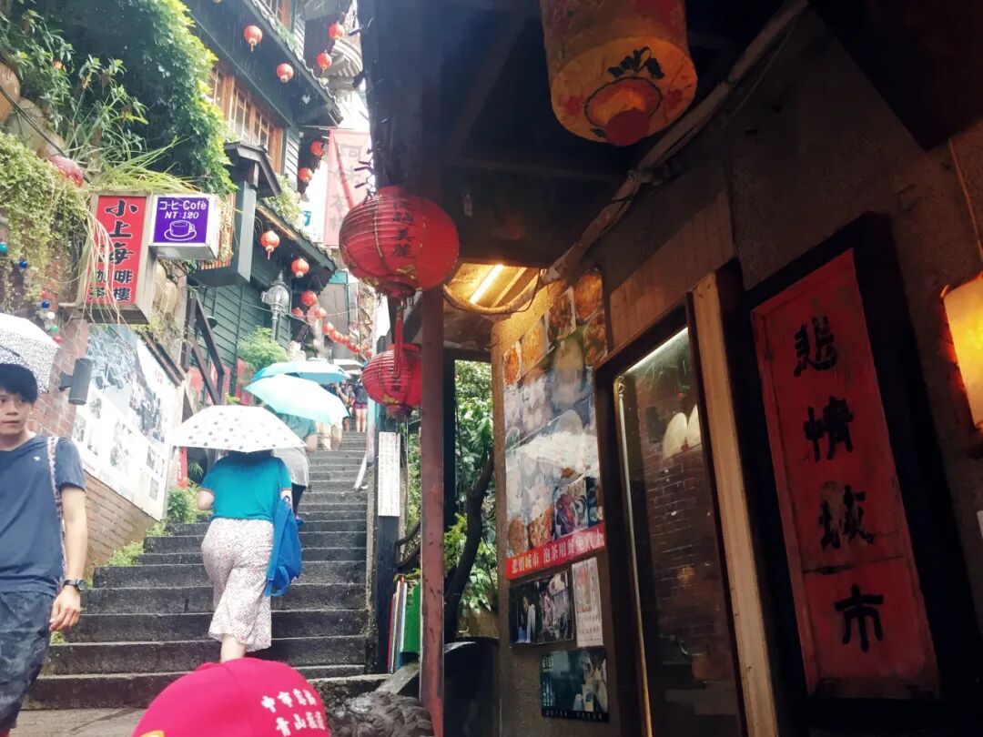 Rainy Jiufen street. A wet street in Jiufen reflecting the lights and lanterns.