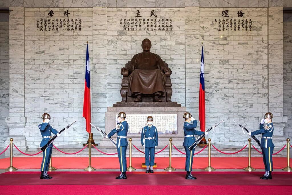Chiang Kai-shek Statue A bronze statue of Chiang Kai-shek seated in the main hall of the memorial.