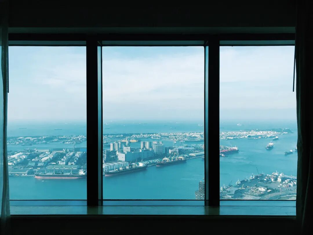 Panoramic view of Kaohsiung city and harbor at dusk