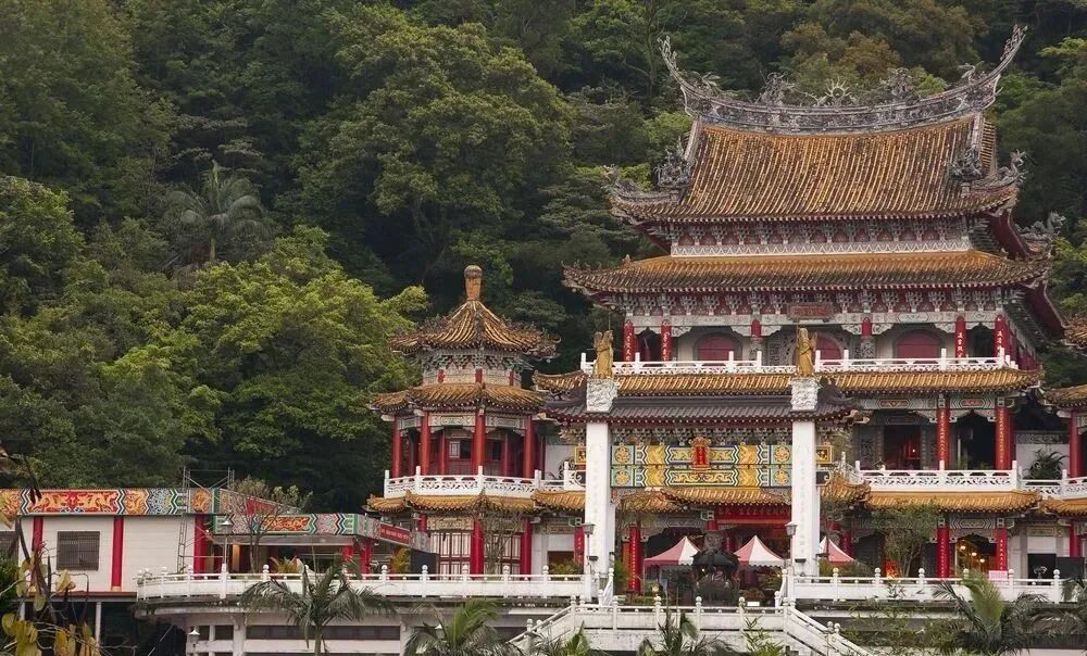 Zhinan Temple complex in Taipei, featuring ornate Taoist architecture and scenic views