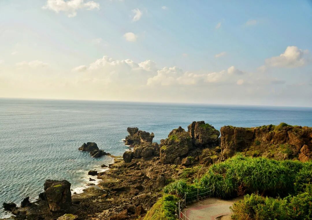 Unique rock formations at Maobitou Park, shaped by ocean waves and erosion