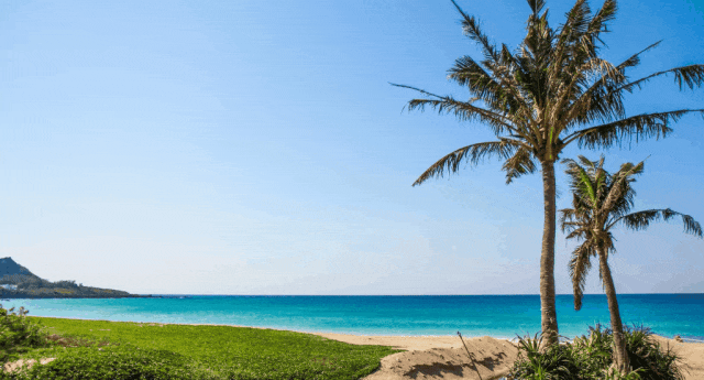 Kenting beach with clear blue water and sunny sky