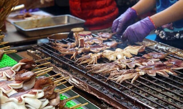 Bustling Ningxia Night Market with various street food stalls