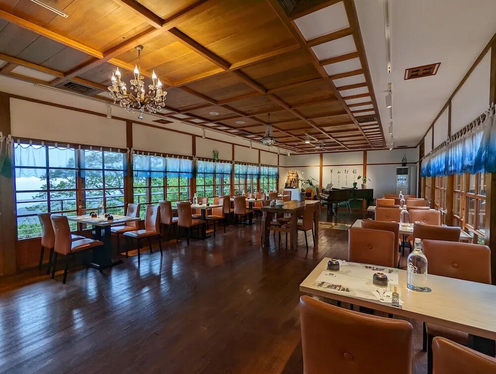 A peaceful hallway or beautifully preserved room, inviting visitors to explore Grass Mountain Chateau