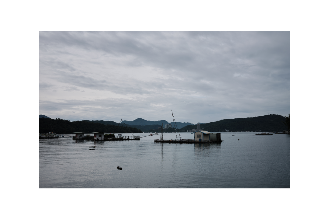 A candid moment from Taichung's lively streets. Discovering Taichung: cityscapes, culture, and cuisine. Pedestrians and buildings along a bustling street in Taichung. Discovering Taichung: cityscapes, culture, and cuisine.